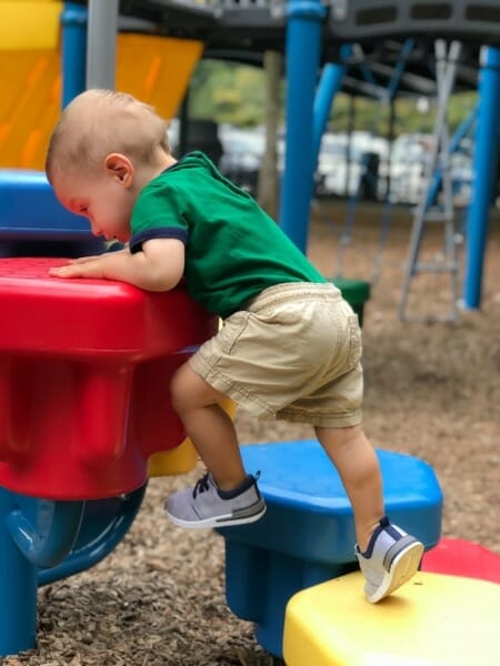 Lucas fearlessly climbing with his new tennis shoes