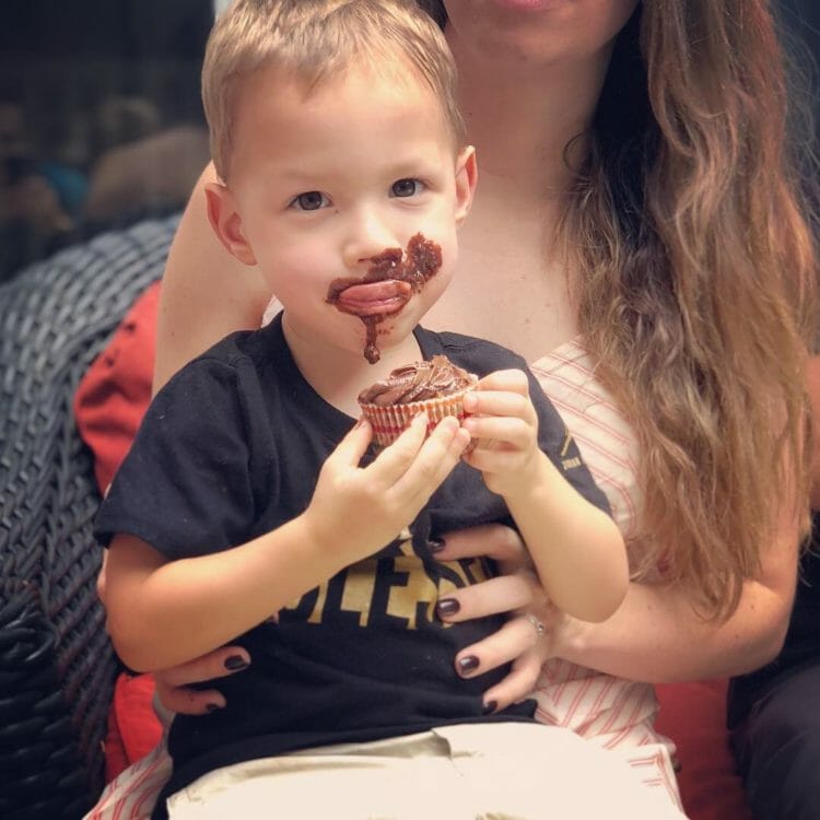 Eating healthy doesn't mean no treats. Here Lucas enjoys a Paleo cupcake