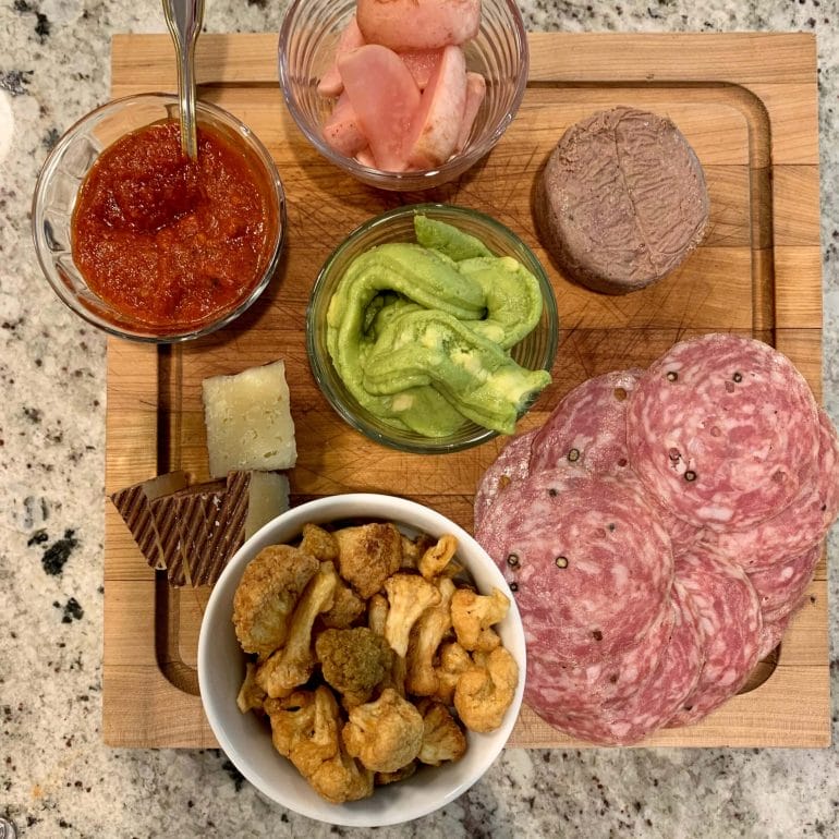 Pickled parsnips, salami, beef liverwurst, tomato sauce (leftovers), goat cheese, guacamole