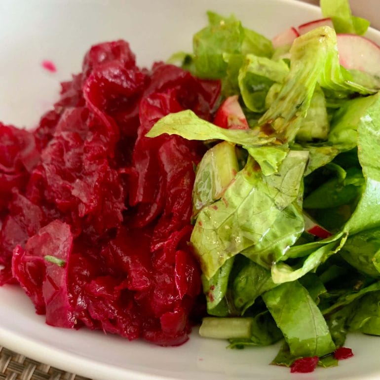 Red beet salad and lettuce with olive oil