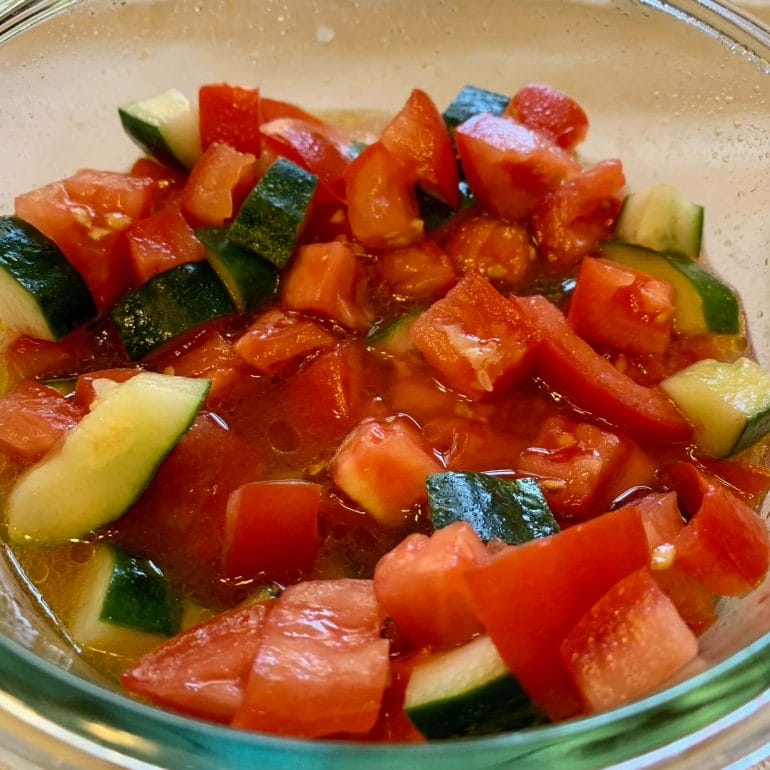Salad made with diced tomatoes and cucumbers