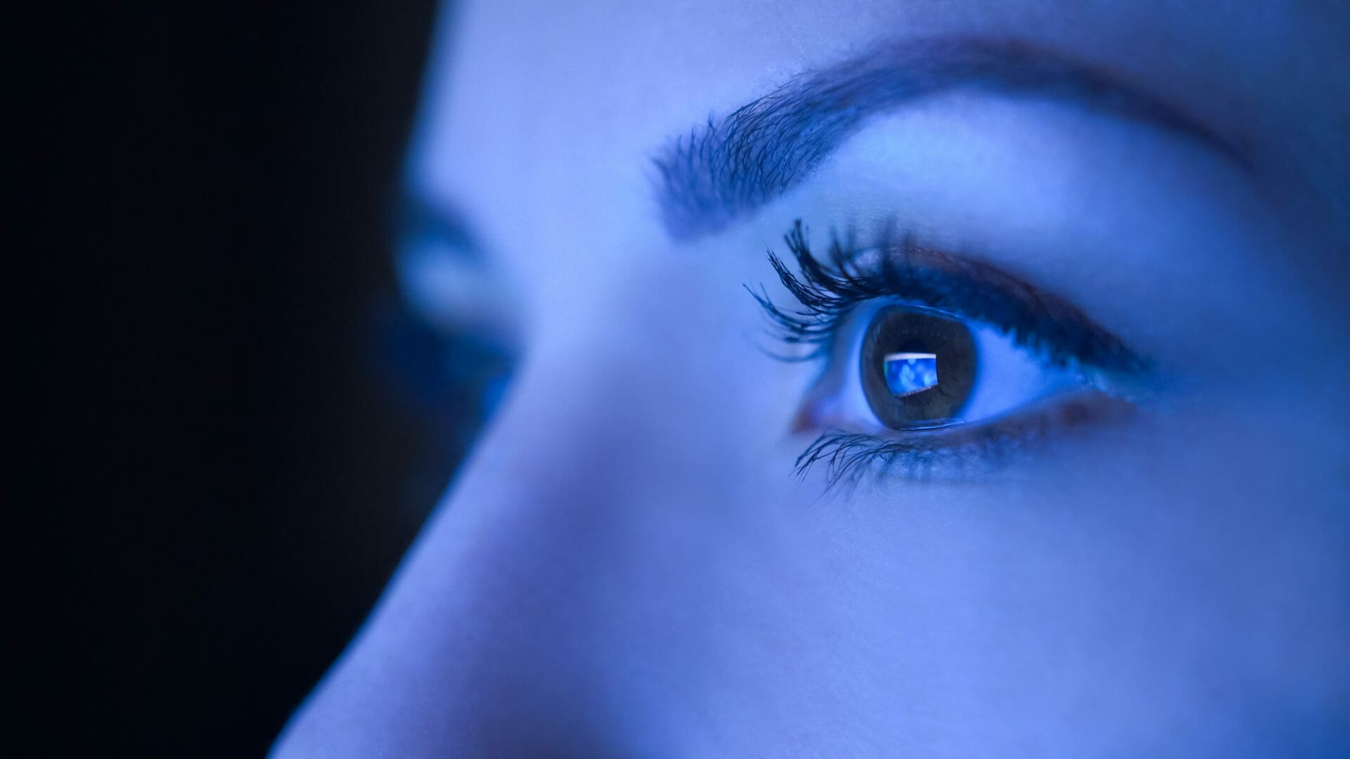 Blue light hitting a woman's eye