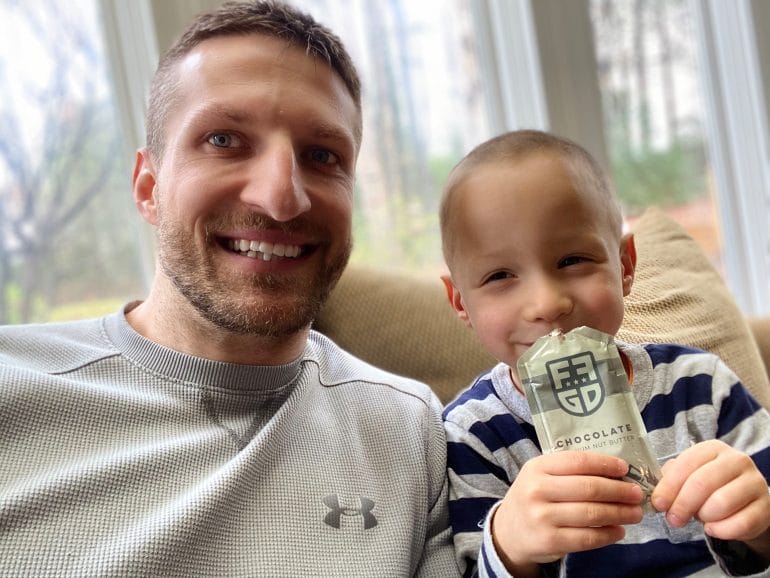 Michael and Lucas enjoying Fat Fit Go Nut Butter
