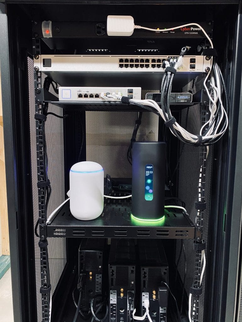 AmpliFi Alien next to UniFi Dream Machine
