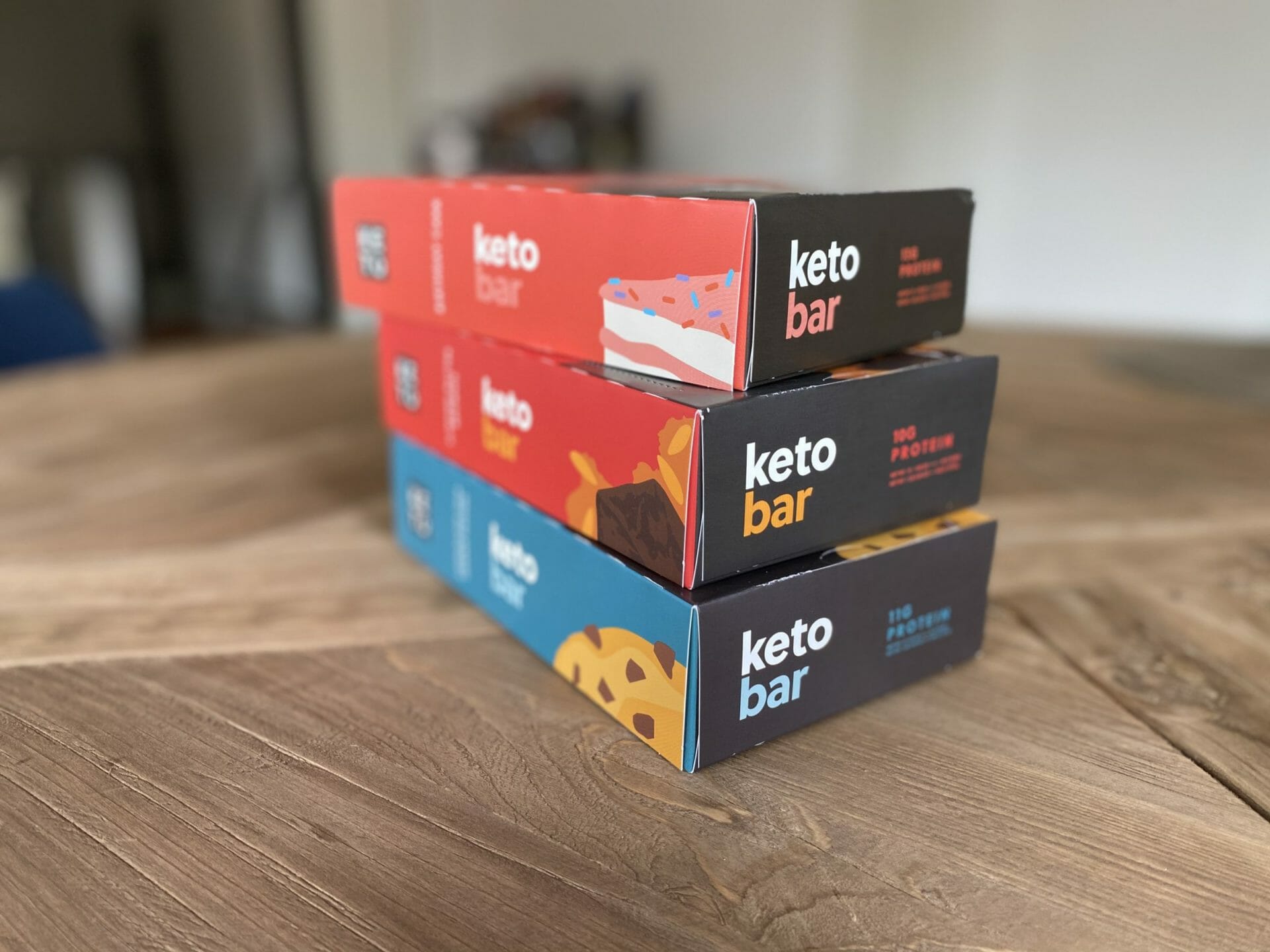 Three boxes of Perfect Keto bars