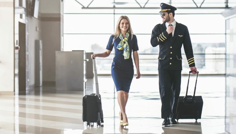 Pilot and flight attendant at airport