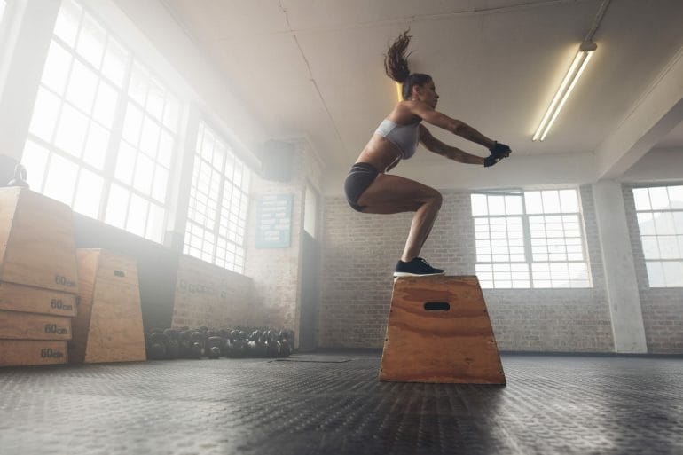 Woman doing box jumps