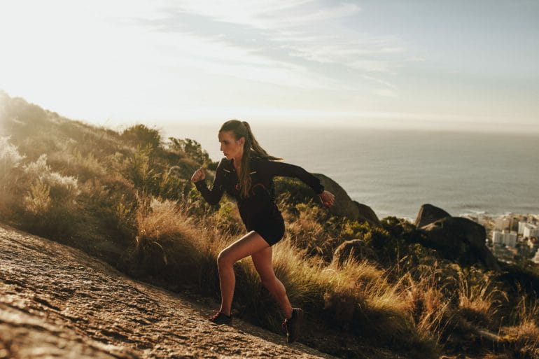 Woman running uphill