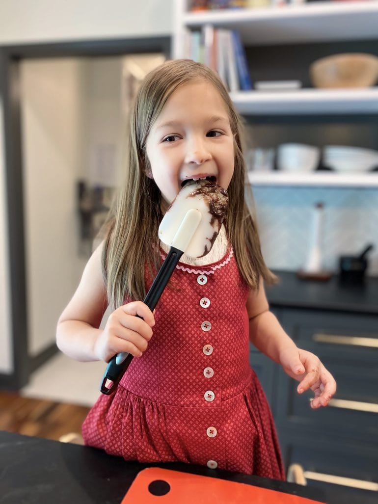 Isabella licking the spatula