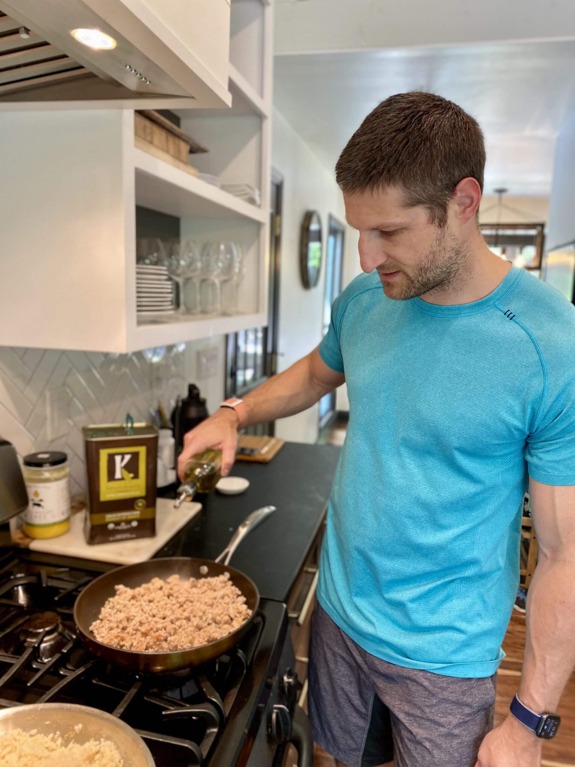 Michael pouring KEVVO over ground meat - 002