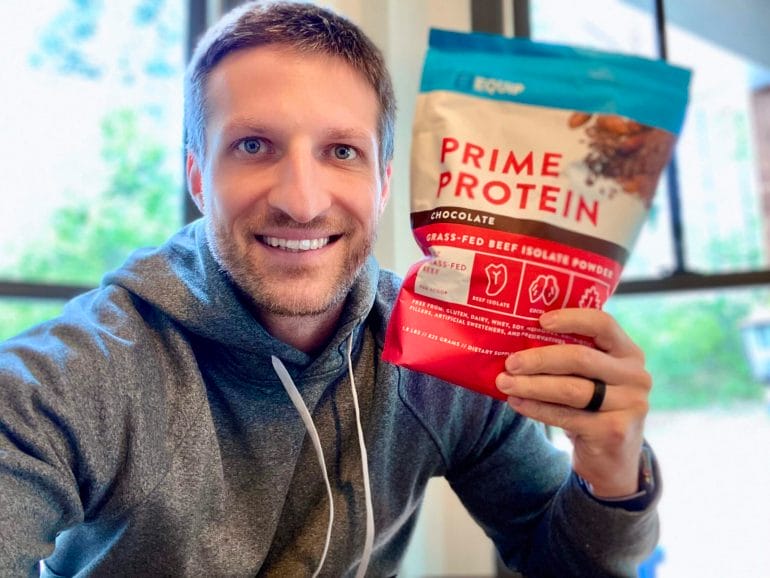 Michael holding Equip Prime Protein