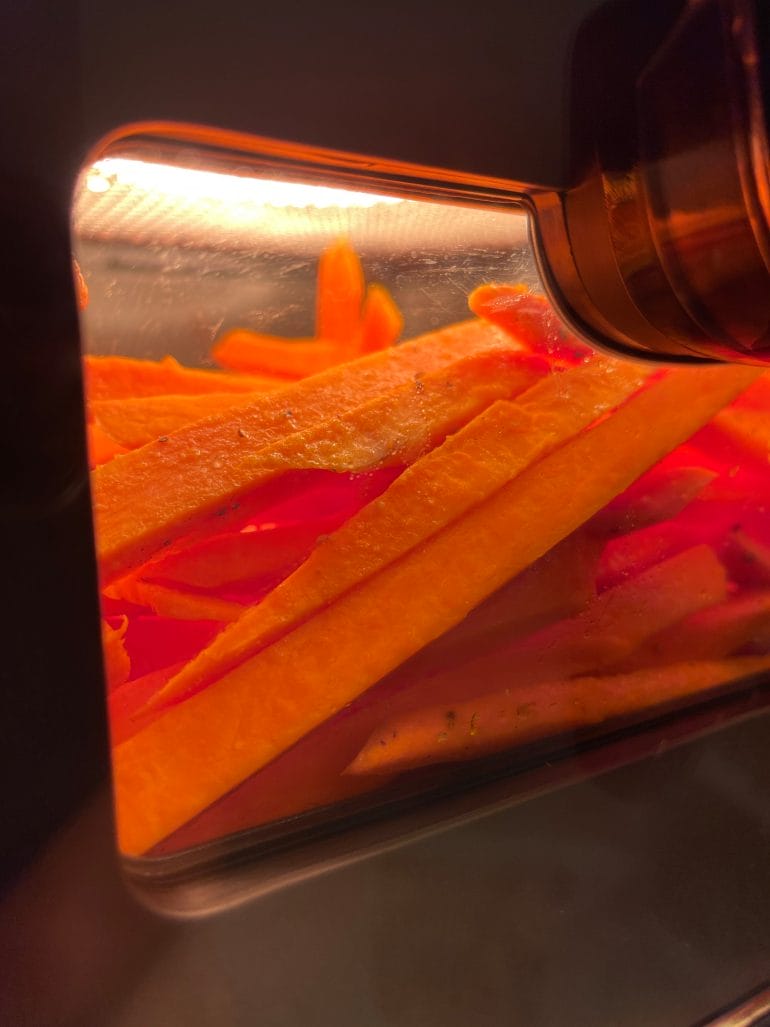Sweet potato fries inside our Kyvol AF60 air fryer