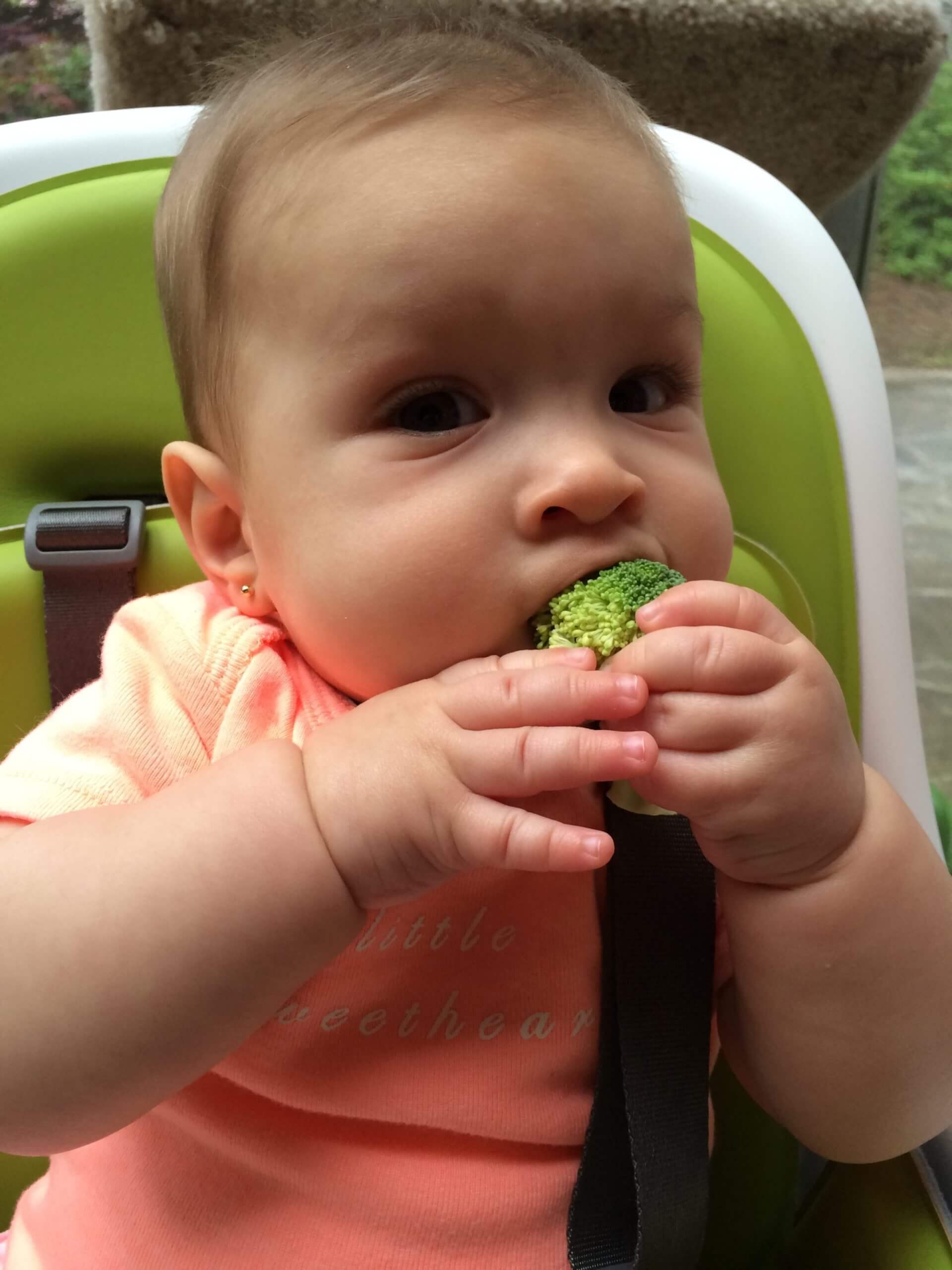 Michael's daughter Isabella eating broccoli for the first time.