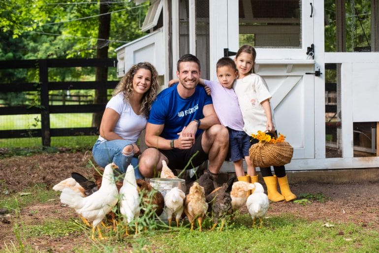 The Kummer family with their chickens.