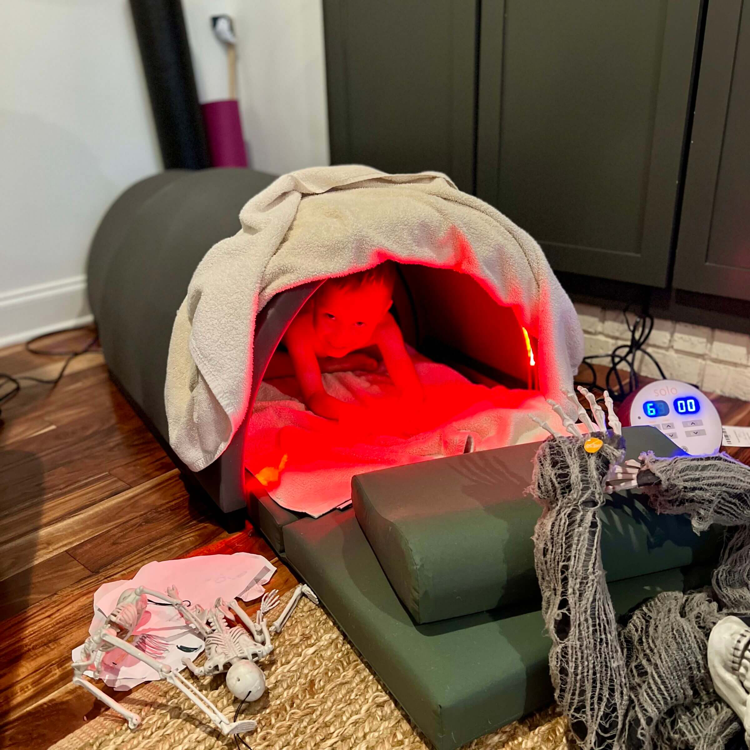 Our six-year-old exploring our infrared sauna.