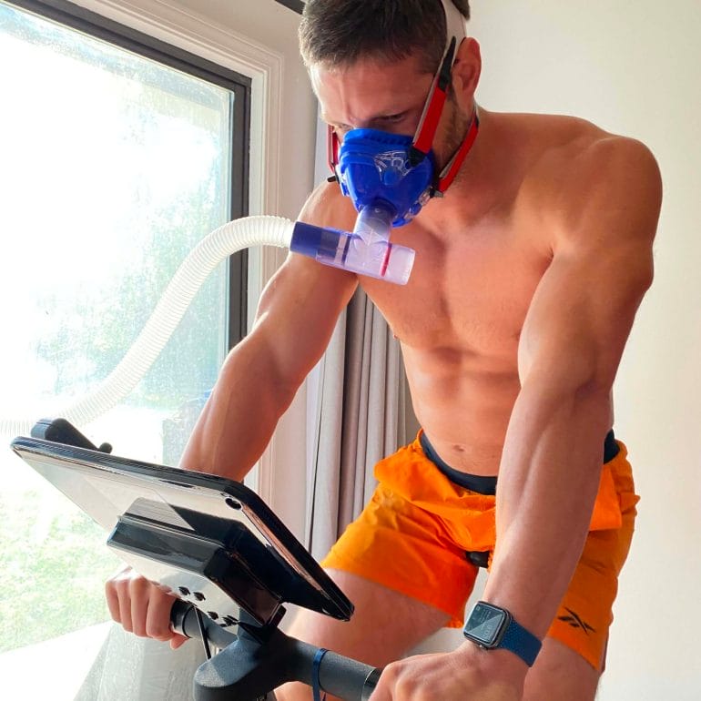 The mask I'm wearing in the photo above is connected to an oxygen compressor that allows me to switch back and forth between 10% and 90% oxygen, a method called intermittent hypoxic training