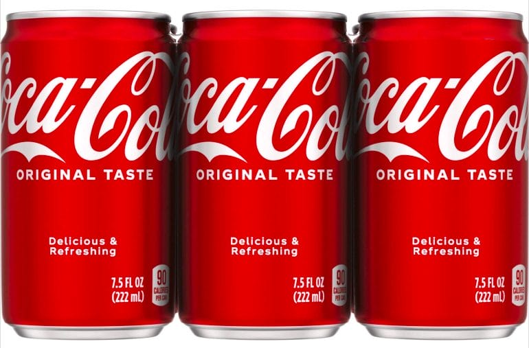 Three cans of Coca-Cola