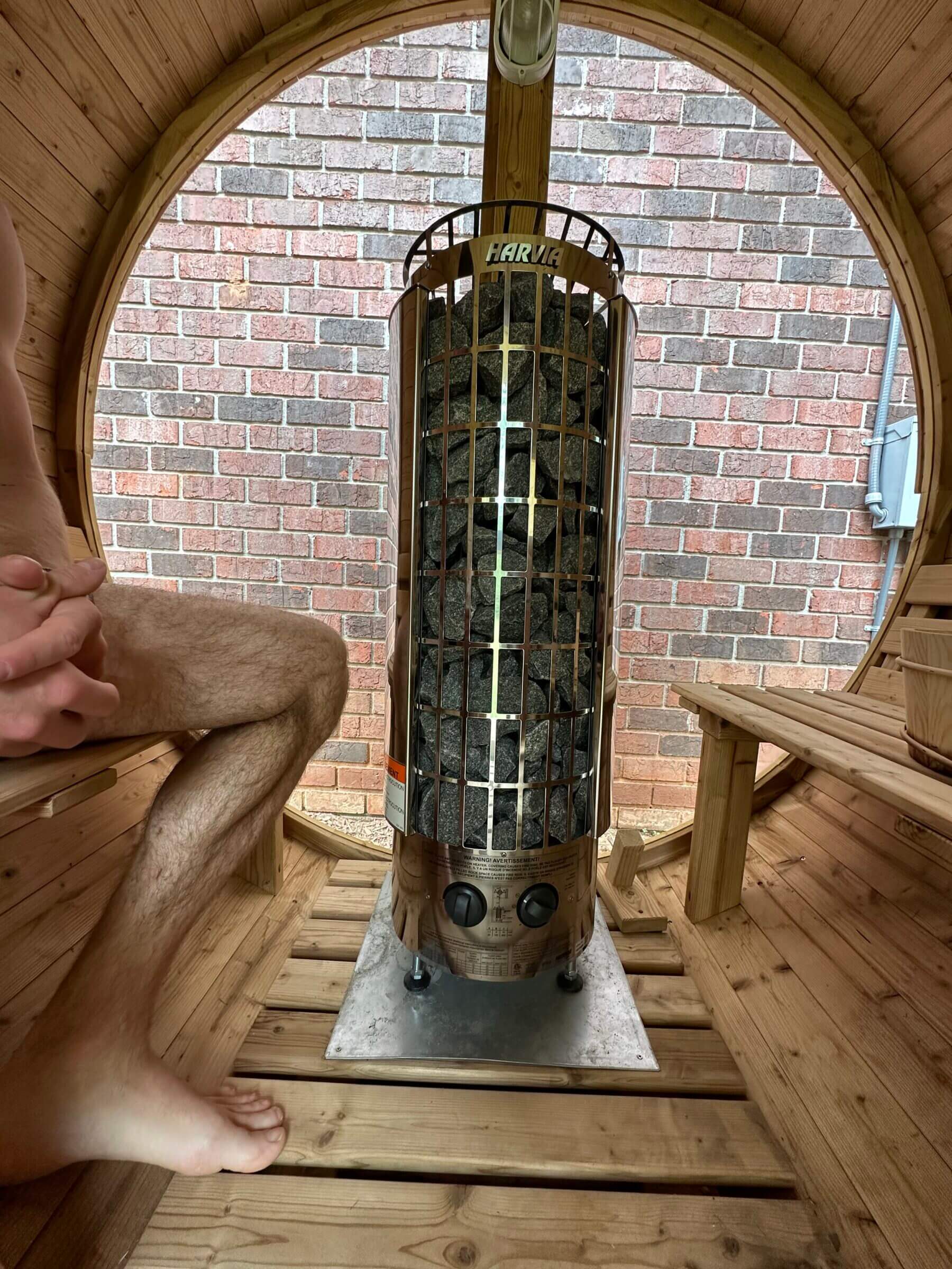 The heater placement makes it inconvenient for anyone to sit towards the back of the sauna