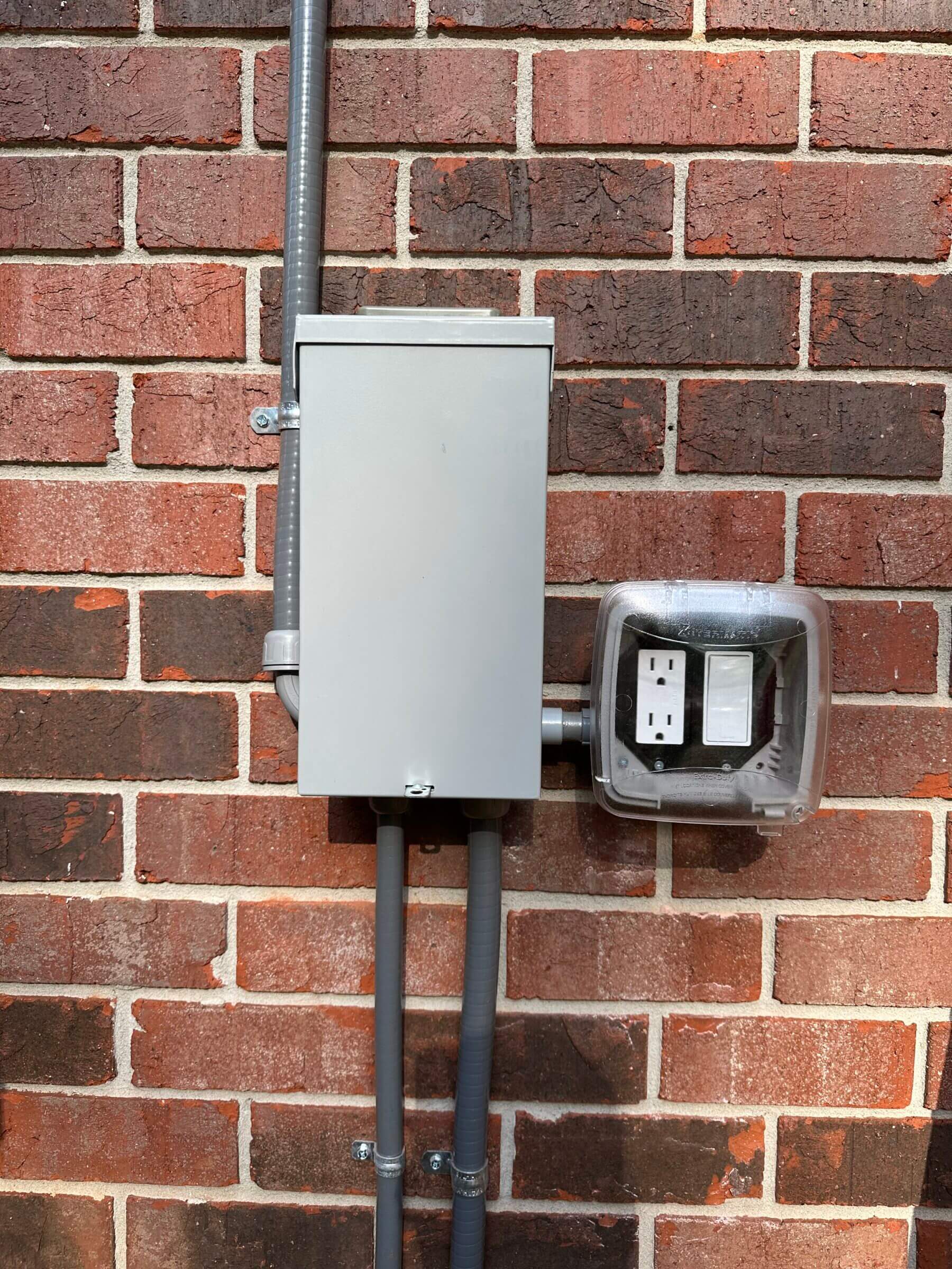 This 50 amp breaker box was required to hook up the sauna heater.