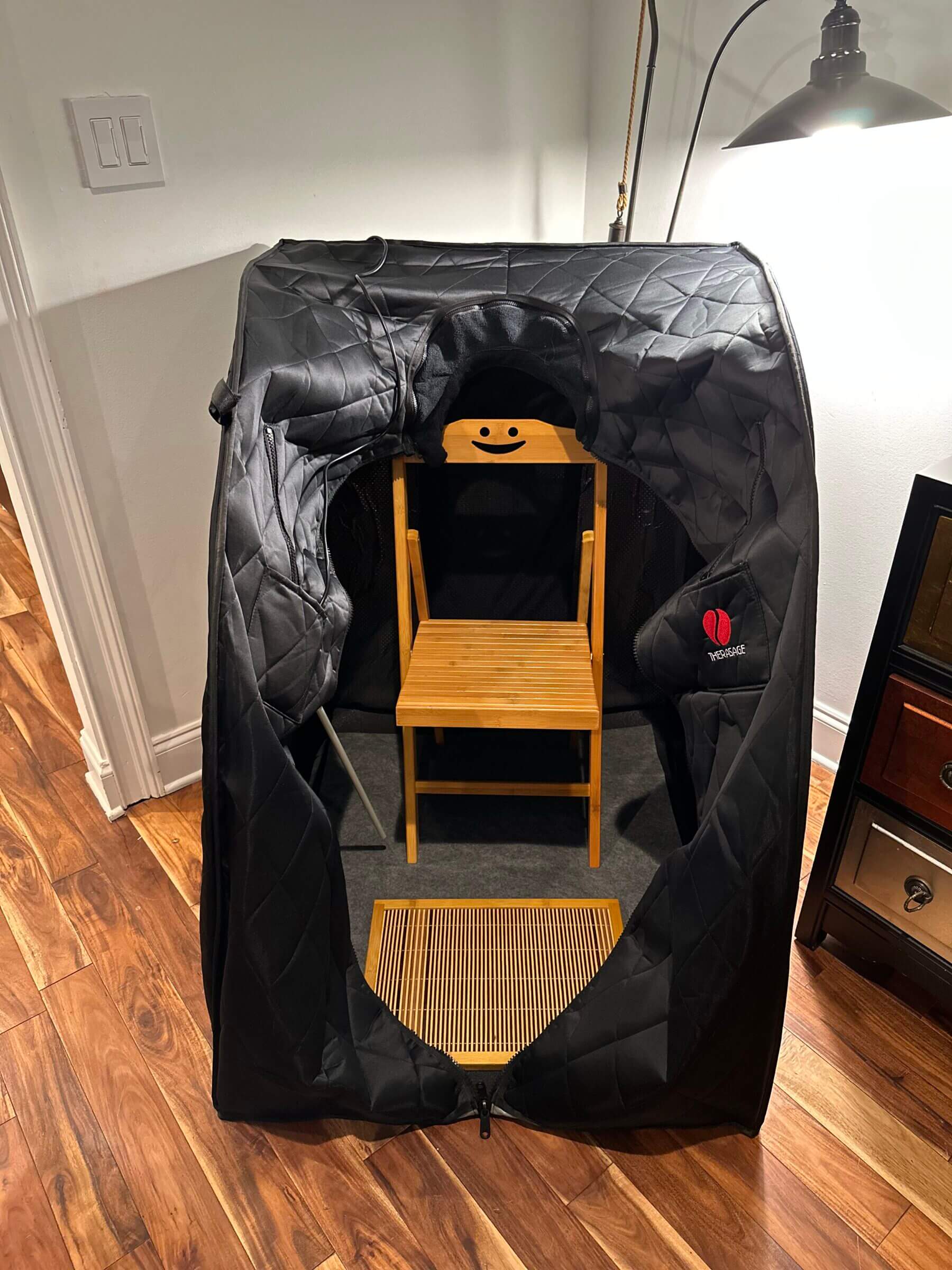 Photo of the Therasage Thera360 personal infrared sauna in the Kummers' living room.