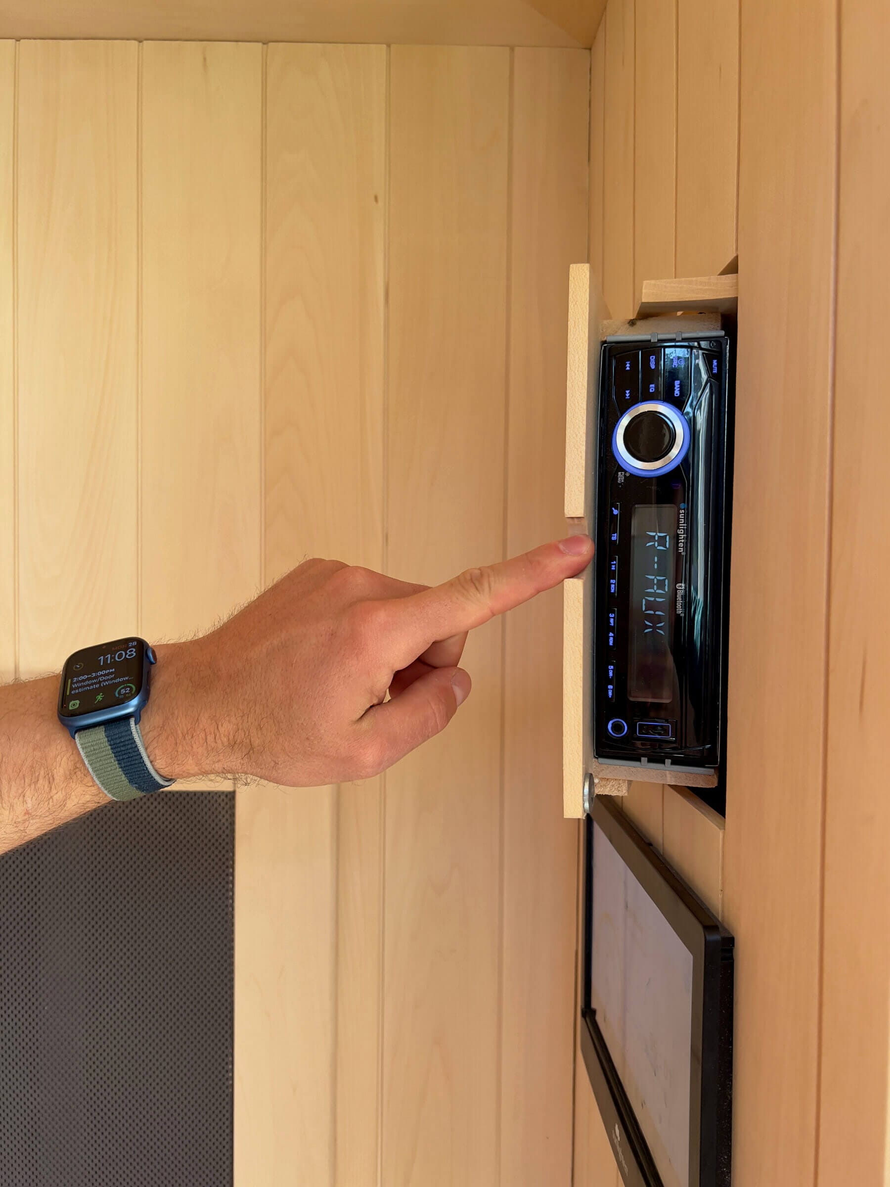 The previous-generation mPulse had an actual car radio built in for volume control, as show above. In the new mPulse Smart Sauna, you control the volume and everything else via the Android tablet.