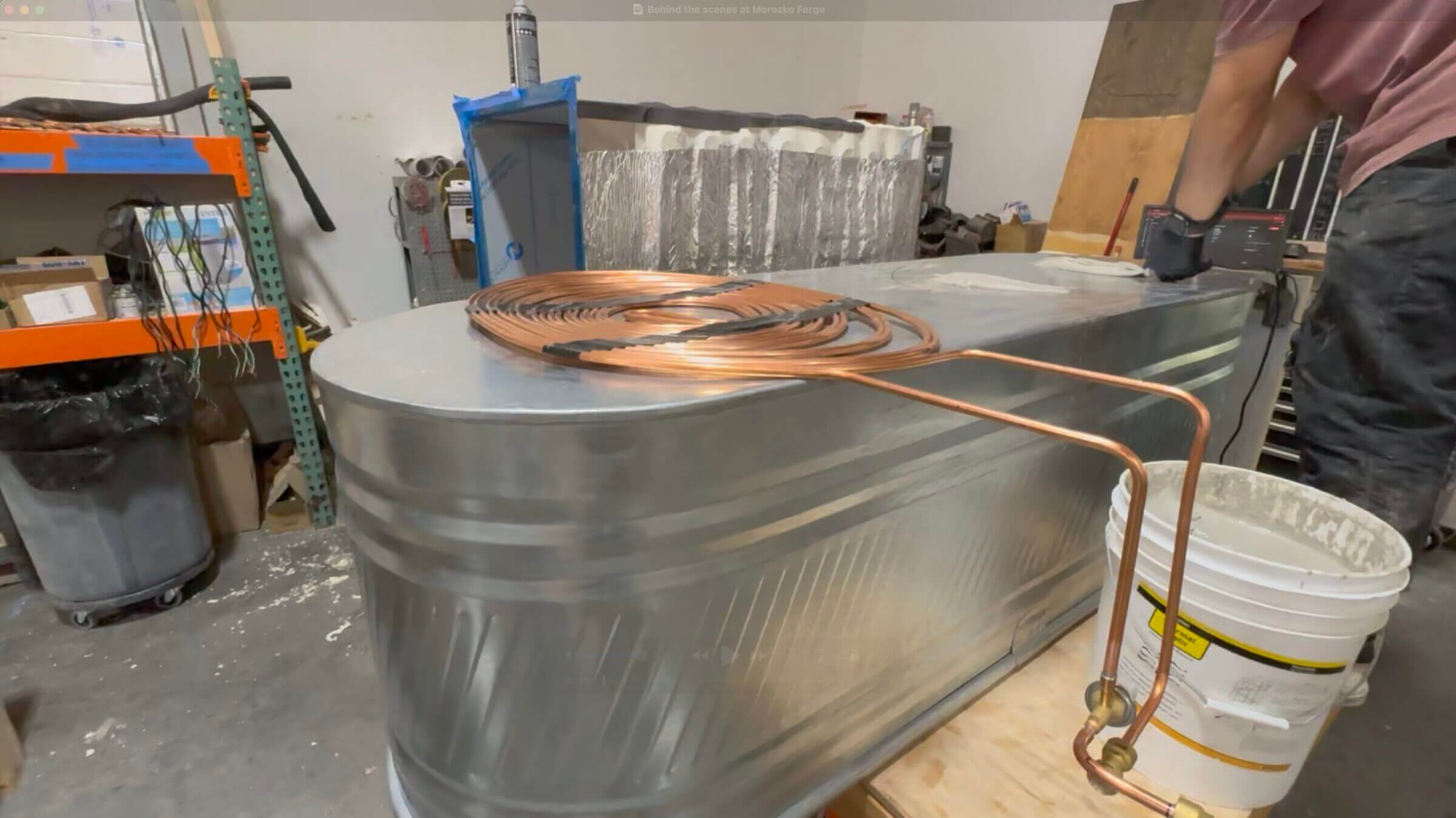 Massive copper coils filled with refrigerant turn water into ice.