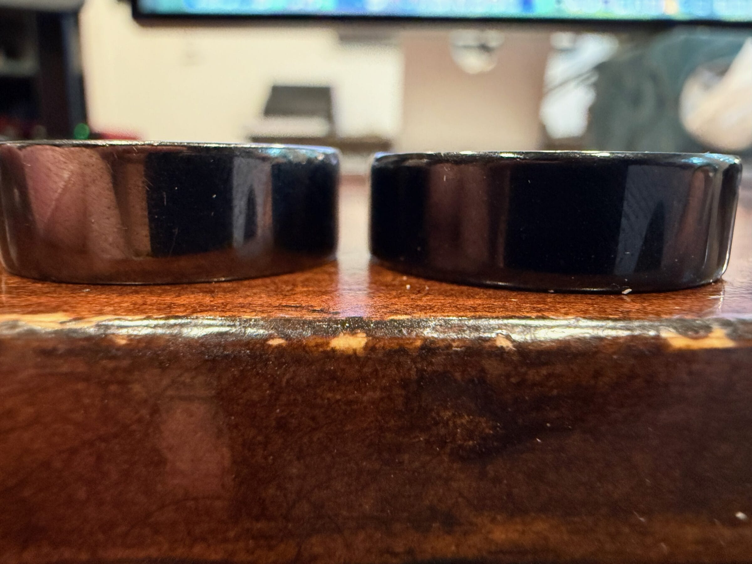 Ultrahuman (left) is slightly wider than Oura Ring (right).