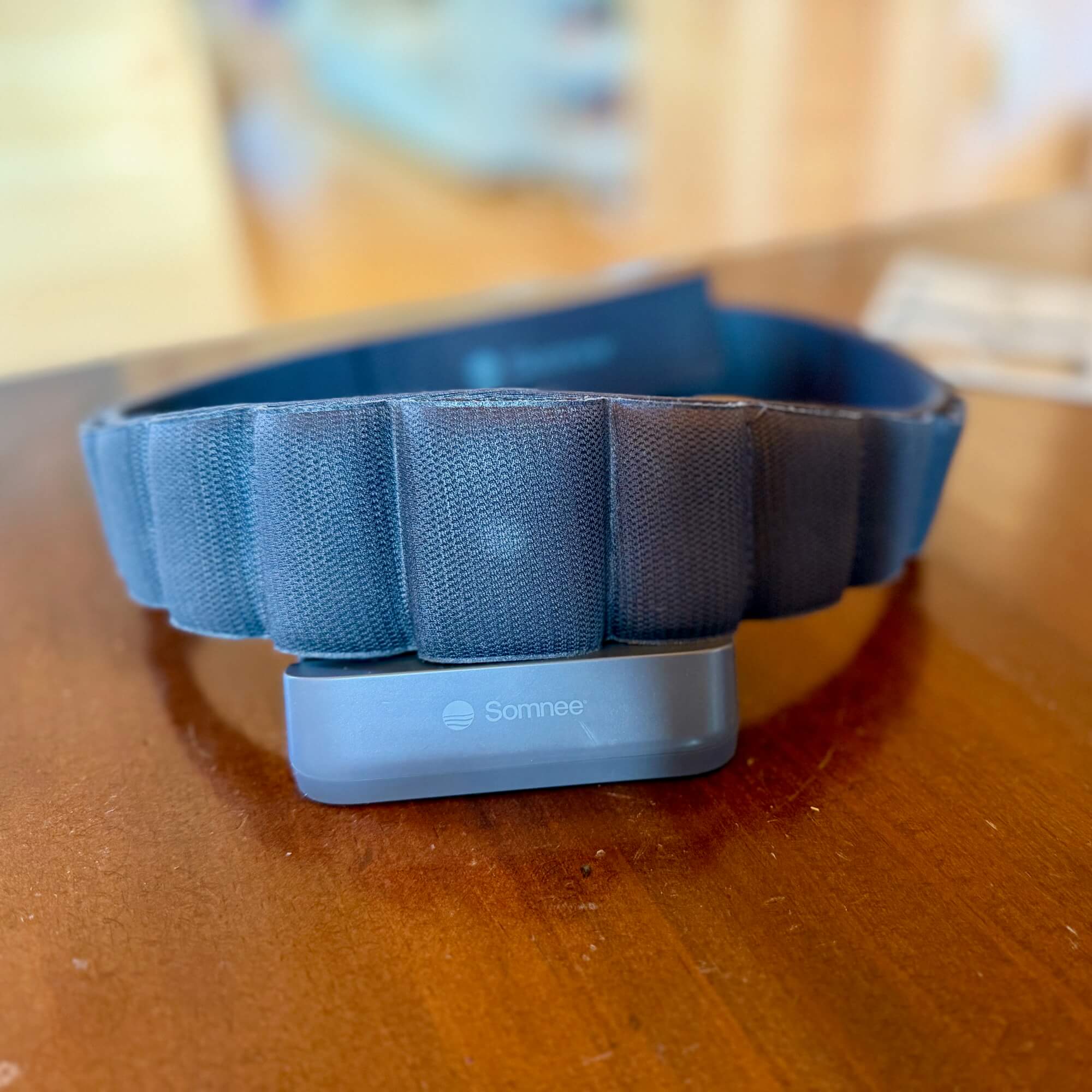 Somnee on its charging stand.