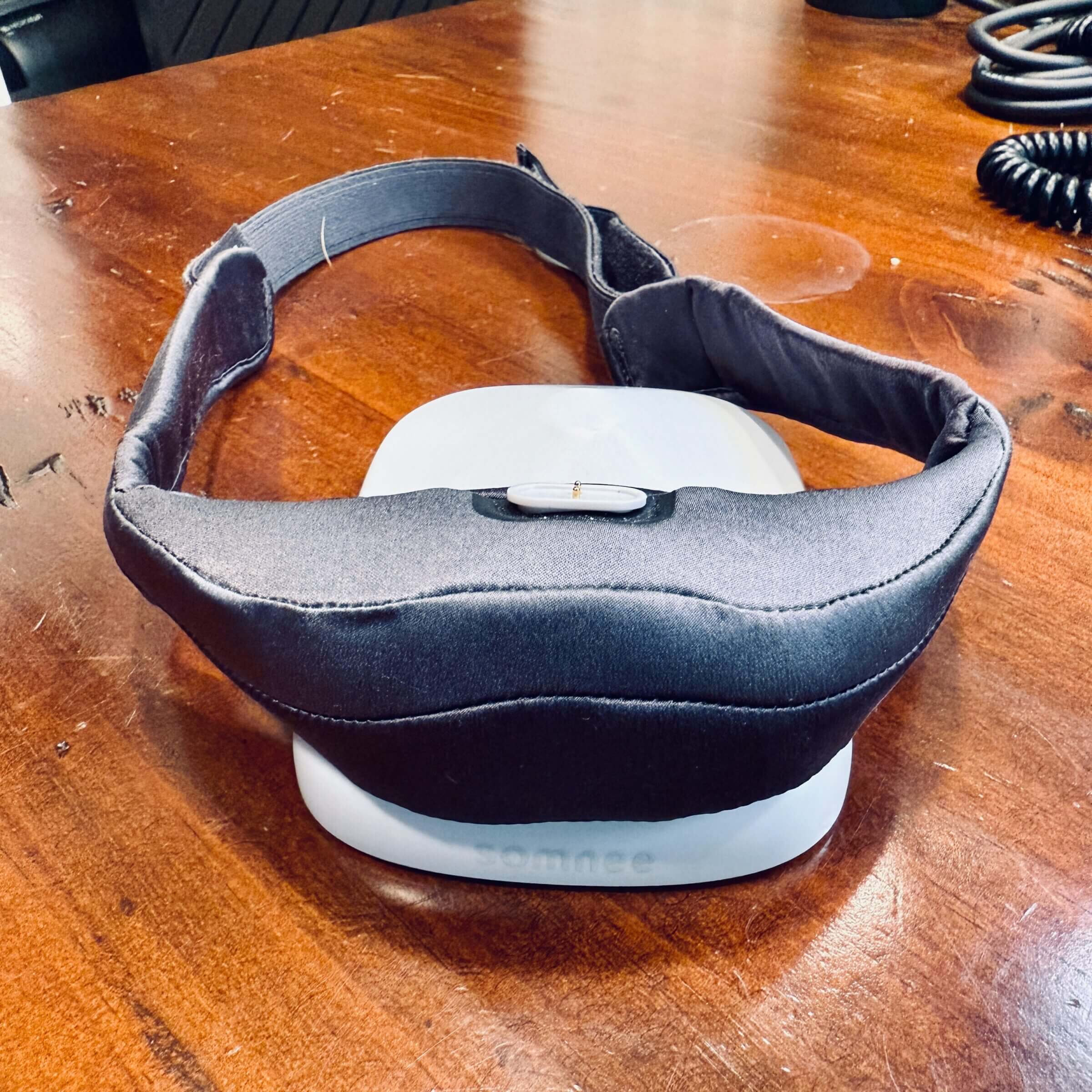 Somnee on its charging stand.